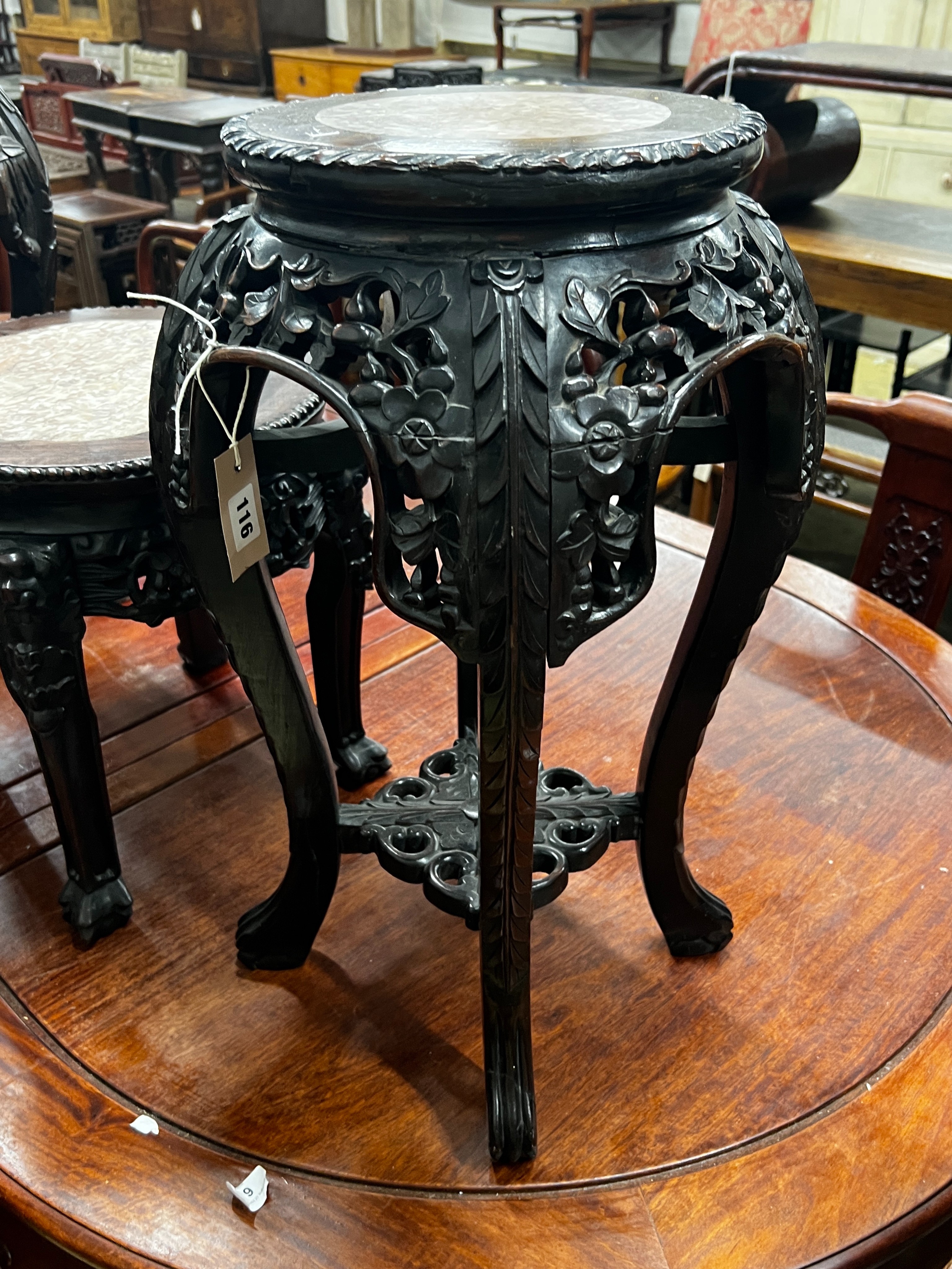 A Chinese circular marble top hongmu vase stand, width 34cm, height 60cm